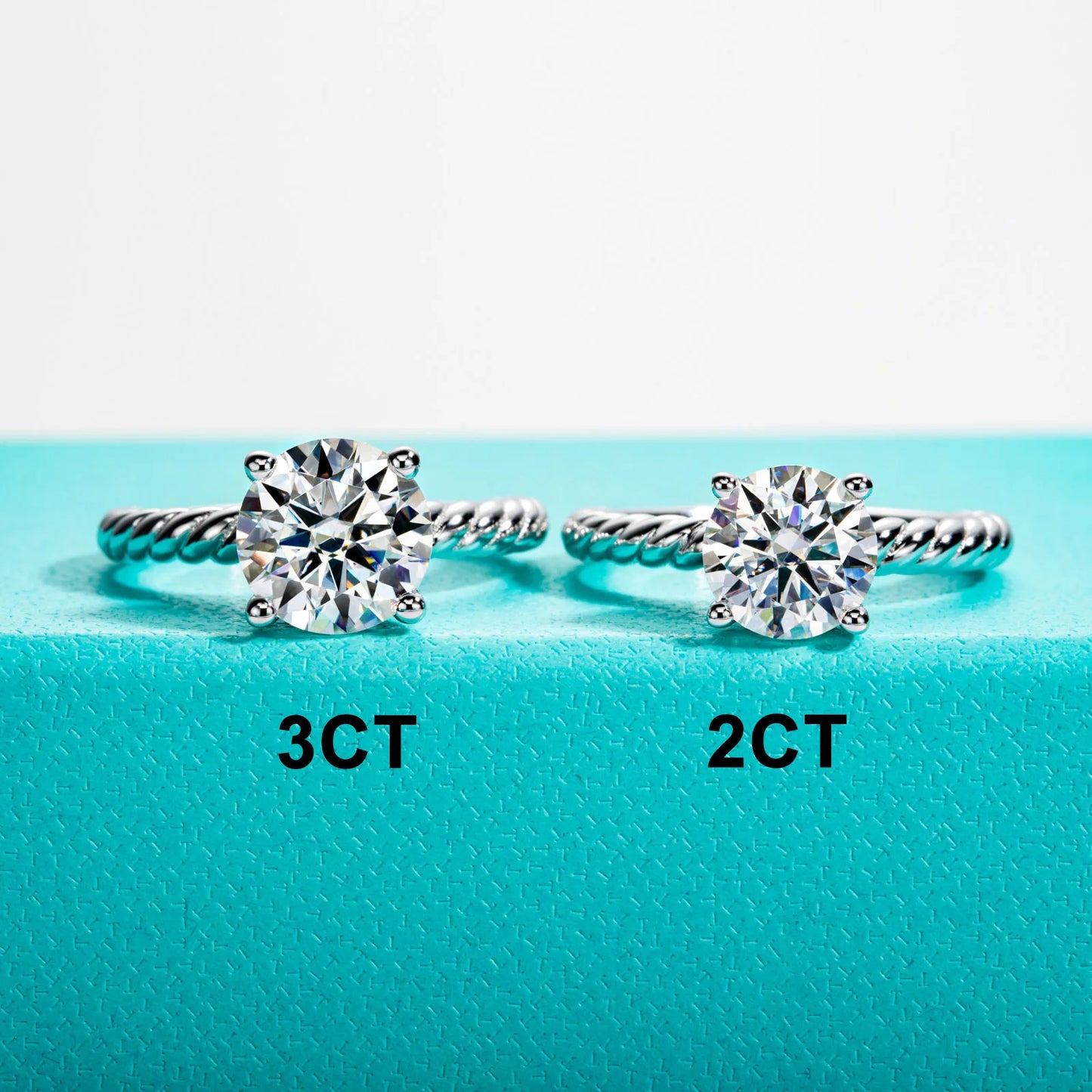 Close-up of 2 and 3ct D color moissanite stone