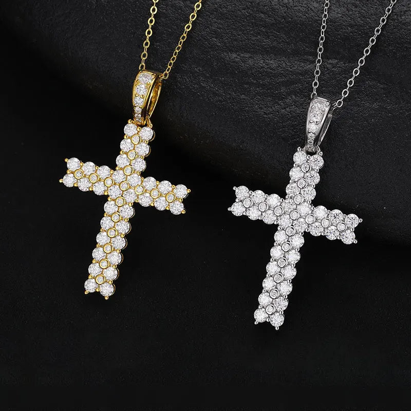 Close-up of moissanite cross pendant in two colors