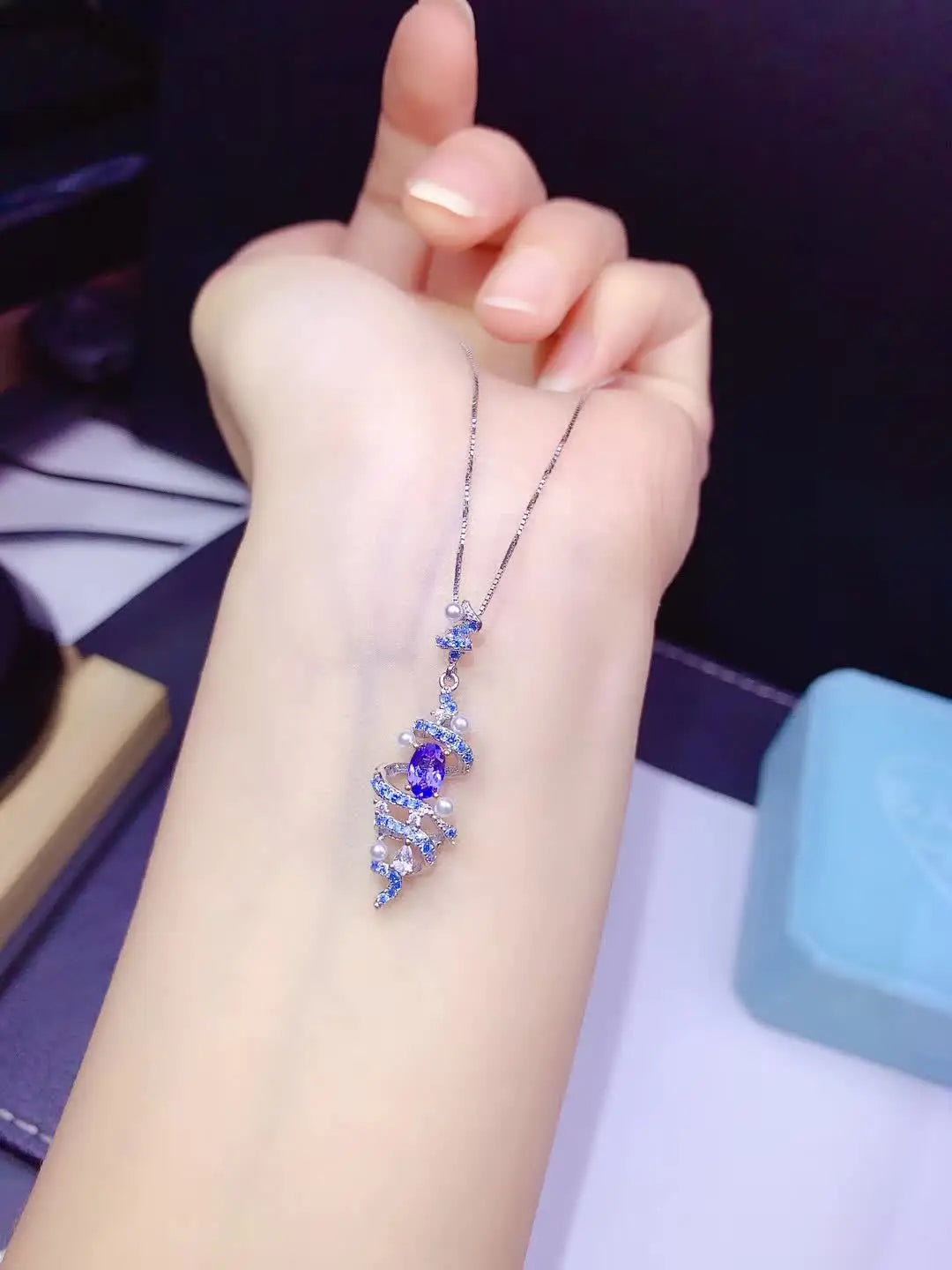 Handmade details of the tanzanite setting