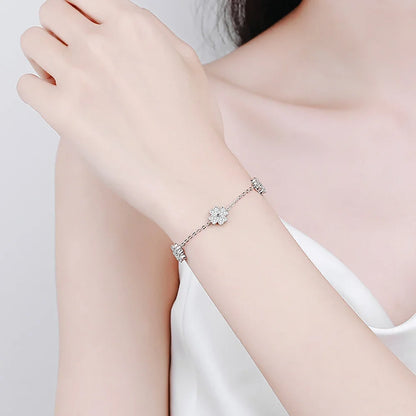 Woman wearing the lucky clover moissanite diamond bracelet