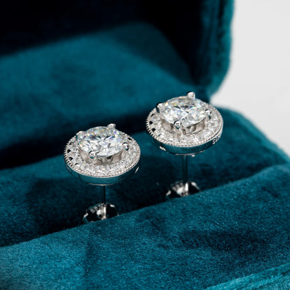 Earrings displayed in an elegant jewelry box