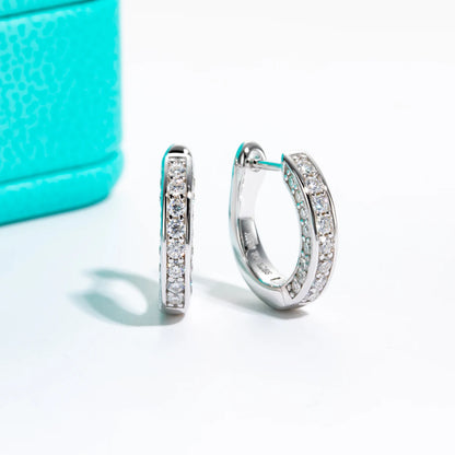 Close-up of moissanite stones on hoop earrings