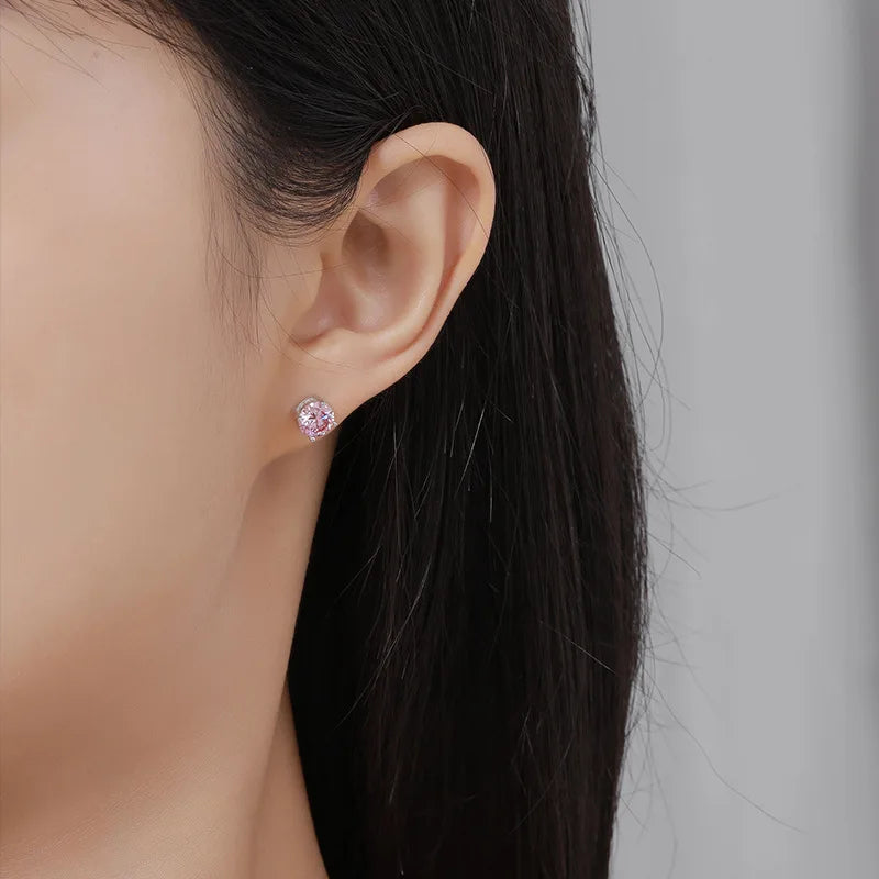 Moissanite earrings on a model