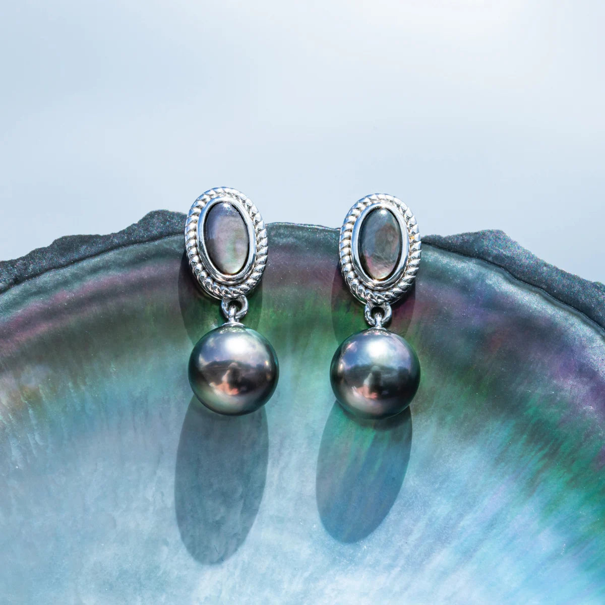 Natural Tahitian Black Pearls glowing in light