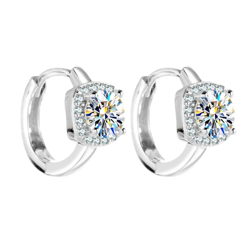 Moissanite stones shining in the earrings