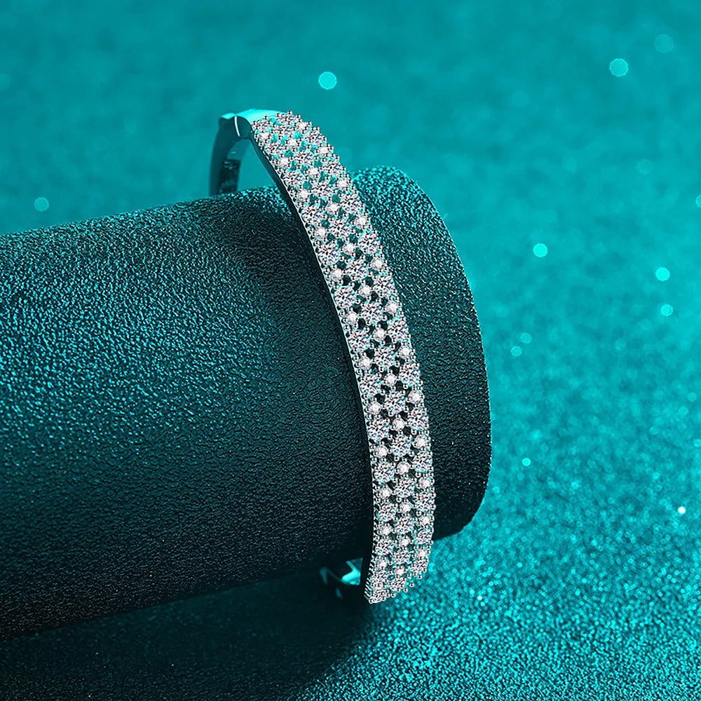 Moissanite bracelet under soft lighting, highlighting its shine