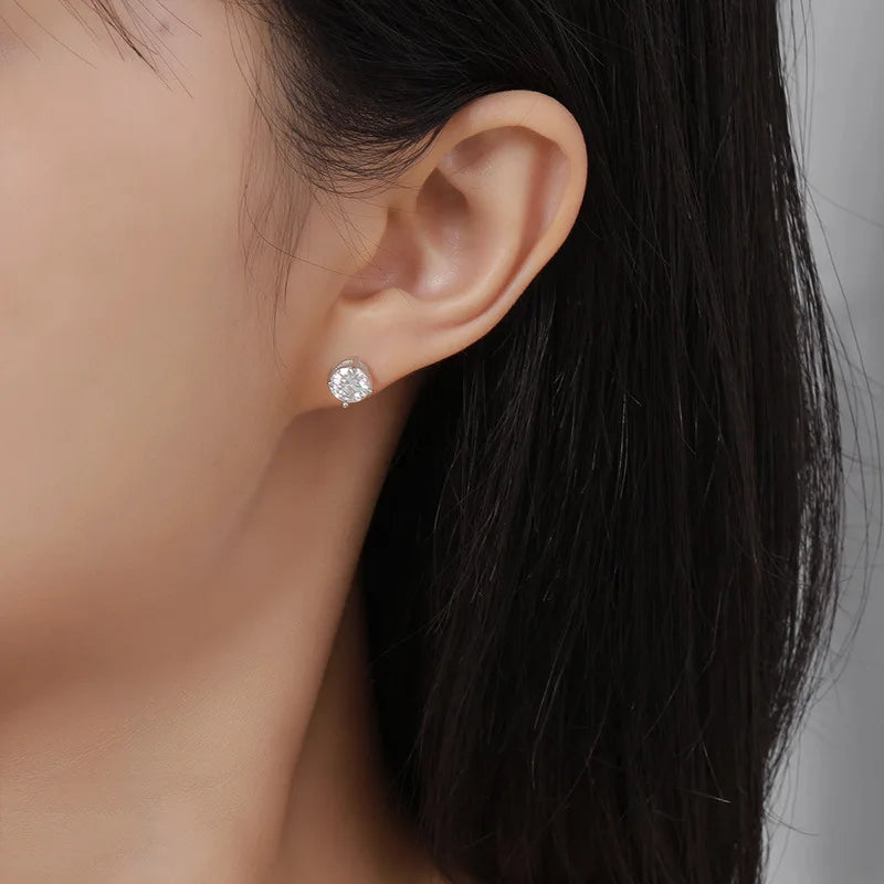 Moissanite earrings on a model