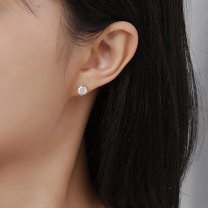 Moissanite earrings on a model