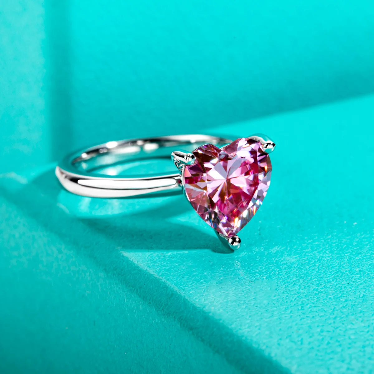 lose-up of heart cut Sakura pink moissanite stone