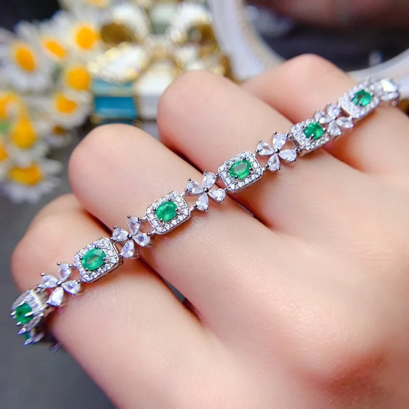 Close-up of the 3x4mm emerald stones